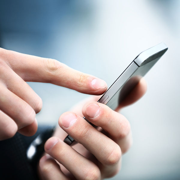 Man using smart phone